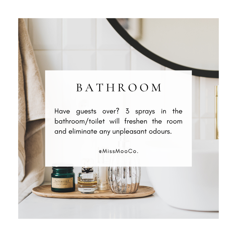 Bathroom setting with candles and using MissMooCo fresheners to freshen the room naturally