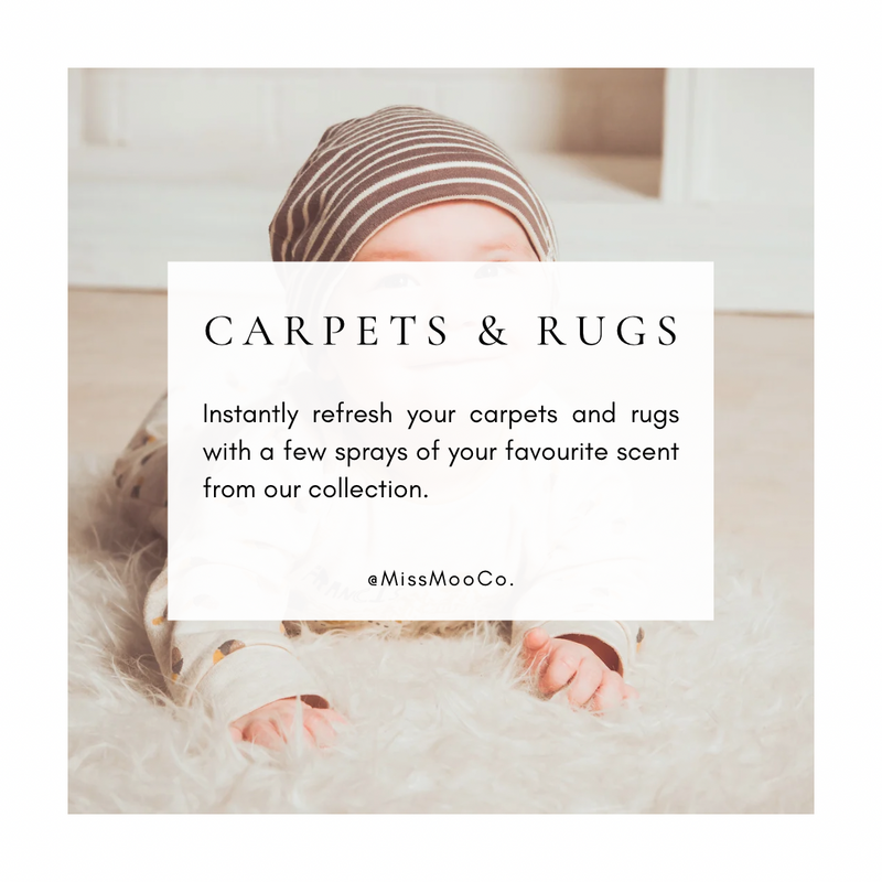 Baby lying on a carpet and using Miss Moo Co products - baby safe room spray